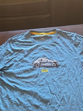 Puma Men's Light Blue Short Sleeve Tee with Car Graphic Puma Porsche Legacy